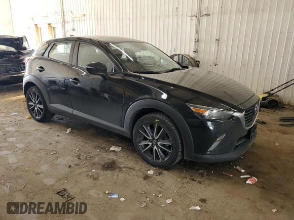 2018 Mazda CX-3 Touring with VIN JM1DKFC70J0316975, listed as a Copart auction lot 48657905 with 76,240 mi miles and Salvage Title. Bid and sale history available at carsss.com. Image 4.