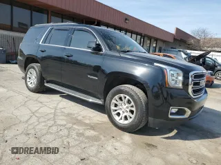 2017 GMC Yukon SLT with VIN 1GKS2BKC1HR217445, listed as a Copart auction lot 48499215 with 104,526 mi miles and Salvage Title. Bid and sale history available at carsss.com. Image 4.