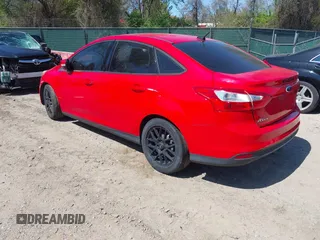 2014 Ford Focus SE with VIN 1FADP3F2XEL164830, listed as a IAAI auction lot 42073107 with 164,519 mi miles. Bid and sale history available at carsss.com. Image 3.