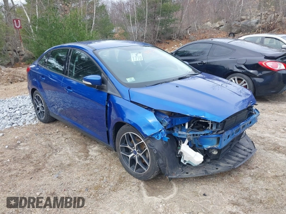 2018 Ford Focus SE z VIN 1FADP3F25JL255840, wystawiony jako IAAI lot #41852913 z przebiegiem 64 010 mil mil oraz . Historia ofert i sprzedaży dostępna na DreamBid. Obrazek 1.
