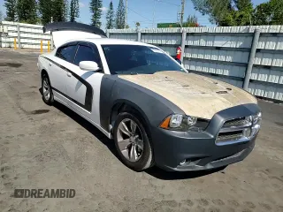 2013 Dodge Charger SE with VIN 2C3CDXBG8DH677551, listed as a Copart auction lot 53260735 with 124,248 mi miles and Salvage Title. Bid and sale history available at DreamBid. Image 11.