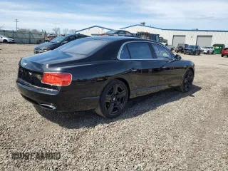 2014 Bentley Flying Spur with VIN SCBEC9ZA7EC095064, listed as a Copart auction lot 52218105 with 24,143 mi miles and Salvage title. Bid and sale history available at DreamBid. Image 3.