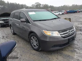 2011 Honda Odyssey EX-L with VIN 5FNRL5H6XBB100535, listed as a IAAI auction lot 41544196 with 261,000 mi miles. Bid and sale history available at carsss.com. Image 1.