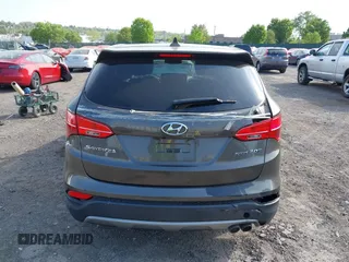 2013 Hyundai Santa Fe Sport z VIN 5XYZW3LA3DG068434, wystawiony jako IAAI lot #42167040 z przebiegiem 140 928 mil mil oraz . Historia ofert i sprzedaży dostępna na DreamBid. Obrazek 17.