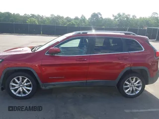 2016 Jeep Cherokee Limited with VIN 1C4PJLDSXGW127497, listed as a IAAI auction lot 42173536 with 240,866 mi miles and . Bid and sale history available at DreamBid. Image 14.