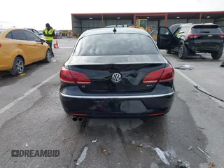 2014 Volkswagen CC R-Line with VIN WVWBN7ANXEE521055, listed as a IAAI auction lot 41197539 with 94,902 mi miles. Bid and sale history available at carsss.com. Image 16.