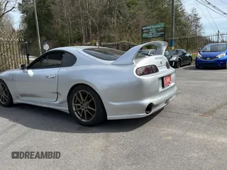 1993 Toyota Supra с VIN JZA800010229, выставлен на аукционе Copart как лот 50000065 с пробегом 130 612 миль миль и Чистый • Clean title. История ставок и продаж доступна на DreamBid. Изображение 3.
