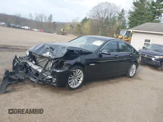 2014 BMW 5 Series 528i xDrive with VIN WBA5A7C52ED616976, listed as a IAAI auction lot 42067334 with 98,286 mi miles and . Bid and sale history available at DreamBid. Image 2.