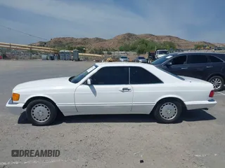 1991 Mercedes-Benz 560 with VIN WDBCA45E7MA610580, listed as a IAAI auction lot 42099161 with 83,344 mi miles and . Bid and sale history available at DreamBid. Image 14.