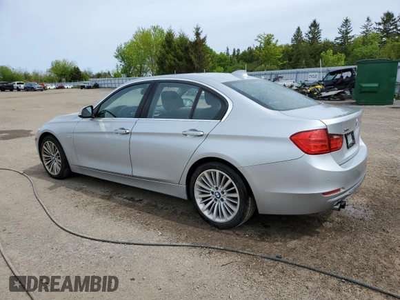2013 BMW 3 Series 328i xDrive with VIN WBA3B3C5XDF531142, listed as a Copart auction lot 58651745 with 209,990 mi miles and Clean title. Bid and sale history available at DreamBid. Image 2.