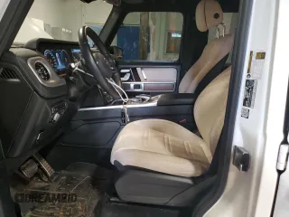 2021 Mercedes-Benz G 550 with VIN W1NYC6BJ0MX404229, listed as a Copart auction lot 82894824 with 104,371 mi miles and Clean Title. Bid and sale history available at DreamBid. Image 7.