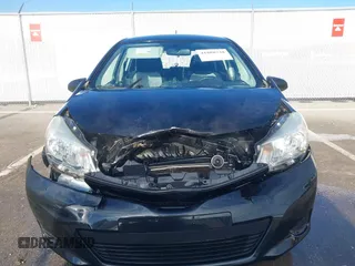 2014 Toyota Yaris L with VIN JTDKTUD36ED586456, listed as a IAAI auction lot 41888730 with 92,742 mi miles. Bid and sale history available at carsss.com. Image 6.