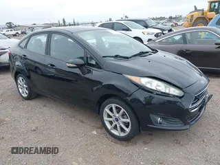 2016 Ford Fiesta SE z VIN 3FADP4BJ6GM107996, wystawiony jako IAAI lot #42433173 z przebiegiem 61 302 mil mil oraz . Historia ofert i sprzedaży dostępna na DreamBid. Obrazek 1.