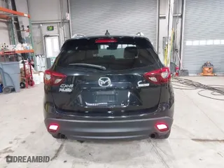 2016 Mazda CX-5 Grand Touring with VIN JM3KE2DY9G0635368, listed as a IAAI auction lot 41699616 with 240,619 mi miles. Bid and sale history available at carsss.com. Image 17.