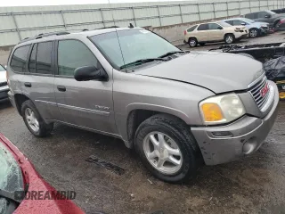 2006 GMC Envoy SLT with VIN 1GKDT13S262141598, listed as a Copart auction lot 45374304 with 258,039 mi miles and Salvage Title. Bid and sale history available at carsss.com. Image 4.