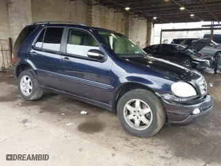 2003 Mercedes-Benz M-Class with VIN 4JGAB75E23A442364, listed as a IAAI auction lot 41958964 with 221,174 mi miles. Bid and sale history available at carsss.com. Image 1.