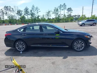2015 Hyundai Genesis 3.8L with VIN KMHGN4JE5FU063075, listed as a IAAI auction lot 42043518 with 135,079 mi miles. Bid and sale history available at carsss.com. Image 13.