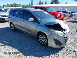 2014 Mazda 5 Sport z VIN JM1CW2BL0E0172678, wystawiony jako IAAI lot #42192057 z przebiegiem 89 848 mil mil oraz . Historia ofert i sprzedaży dostępna na DreamBid. Obrazek 1.
