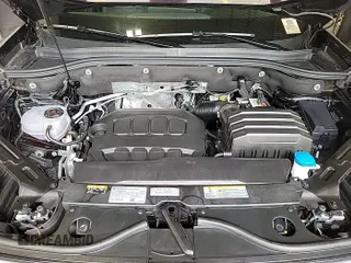 2024 Volkswagen Atlas SE with VIN 1V2HR2CA7RC575005, listed as a IAAI auction lot 42731226 with 14,322 mi miles and . Bid and sale history available at DreamBid. Image 2.