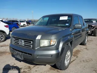 2007 Honda Ridgeline RTL w/Leather with VIN 2HJYK16547H526249, listed as a IAAI auction lot 41769625 with 173,168 mi miles. Bid and sale history available at carsss.com. Image 2.
