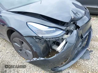 2023 Tesla Model 3 with VIN 5YJ3E1EA0PF473754, listed as a IAAI auction lot 42351494 with Not provided miles and . Bid and sale history available at DreamBid. Image 11.