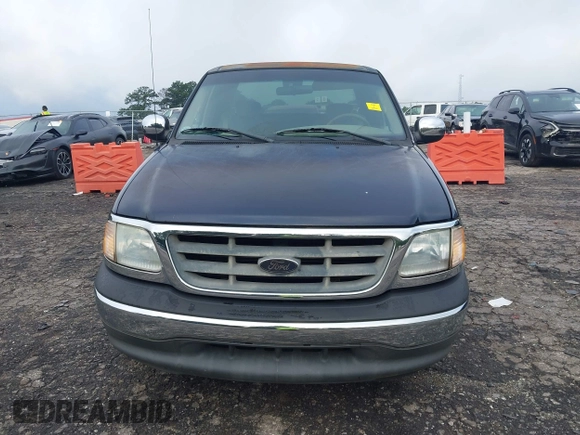 2002 Ford F-150 XL with VIN 1FTRX17202NA66022, listed as a IAAI auction lot 42382320 with 87,916 mi miles and . Bid and sale history available at DreamBid. Image 12.
