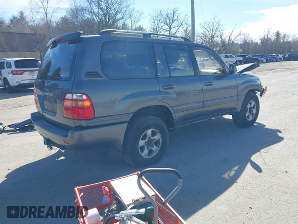 1999 Toyota Land Cruiser with VIN JT3HT05J5X0045784, listed as a IAAI auction lot 41886919 with 505,121 mi miles. Bid and sale history available at carsss.com. Image 4.