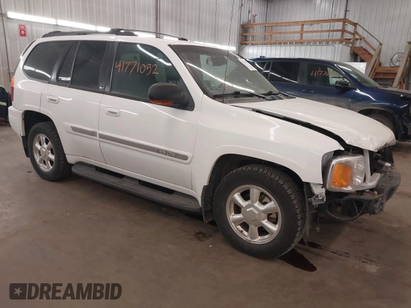 2003 GMC Envoy SLT with VIN 1GKDT13S332222847, listed as a IAAI auction lot 41771052 with 203,699 mi miles. Bid and sale history available at carsss.com. Image 1.