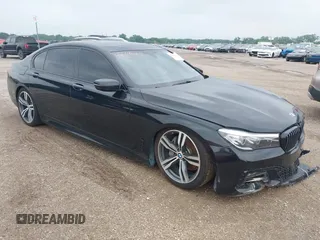 2017 BMW 7 Series 740i z VIN WBA7E2C36HG741092, wystawiony jako IAAI lot #42029625 z przebiegiem 60 389 mil mil oraz . Historia ofert i sprzedaży dostępna na DreamBid. Obrazek 1.