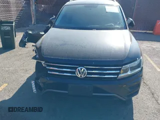 2021 Volkswagen Tiguan S with VIN 3VV1B7AX2MM142289, listed as a IAAI auction lot 42403346 with 71,182 mi miles and . Bid and sale history available at DreamBid. Image 12.