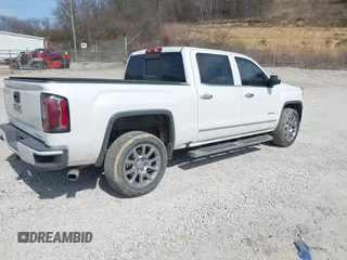 2017 GMC Sierra 1500 Denali with VIN 3GTU2PEC5HG164021, listed as a IAAI auction lot 41784101 with 69,167 mi miles and . Bid and sale history available at DreamBid. Image 4.
