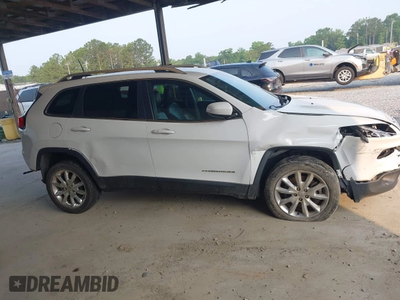 2016 Jeep Cherokee Limited z VIN 1C4PJLDB8GW233818, wystawiony jako IAAI lot #42376960 z przebiegiem 110 160 mil mil oraz . Historia ofert i sprzedaży dostępna na DreamBid. Obrazek 14.