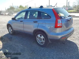 2007 Honda CR-V LX with VIN JHLRE38357C055256, listed as a IAAI auction lot 42050441 with 311,062 mi miles. Bid and sale history available at carsss.com. Image 3.