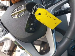 2012 Hyundai Accent SE with VIN KMHCU5AE8CU015055, listed as a IAAI auction lot 41814610 with 141,769 mi miles. Bid and sale history available at carsss.com. Image 11.
