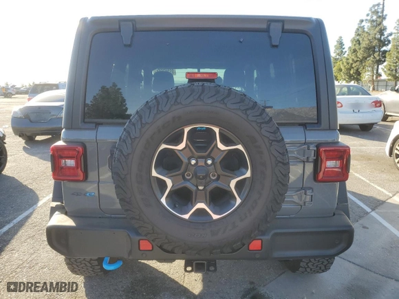2022 Jeep Wrangler 4xe Unlimited Rubicon with VIN 1C4JJXR62NW172990, listed as a Copart auction lot 85297694 with 29,809 mi miles and Salvage Title. Bid and sale history available at carsss.com. Image 6.