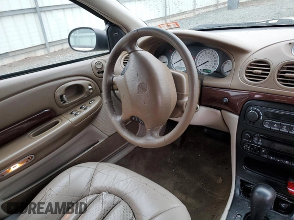 2000 Chrysler 300M M z VIN 2C3HE66G7YH139310, wystawiony jako Copart lot #64405754 z przebiegiem 153 432 mil mil oraz Szkoda całkowita • Salvage title. Historia ofert i sprzedaży dostępna na DreamBid. Obrazek 7.