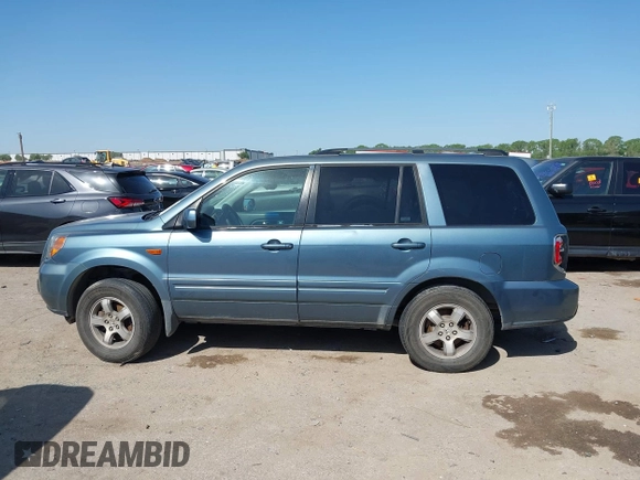 2006 Honda Pilot EX-L with VIN 2HKYF18506H521822, listed as a IAAI auction lot 42012612 with 187,946 mi miles and . Bid and sale history available at DreamBid. Image 14.
