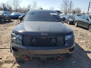 2021 Jeep Grand Cherokee Trailhawk with VIN 1C4RJFLT8MC757858, listed as a Copart auction lot 48200125 with 66,145 mi miles and Salvage Title. Bid and sale history available at carsss.com. Image 5.