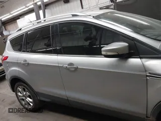 2015 Ford Escape Titanium with VIN 1FMCU0J96FUB81598, listed as a IAAI auction lot 41872114 with 122,001 mi miles and . Bid and sale history available at DreamBid. Image 13.