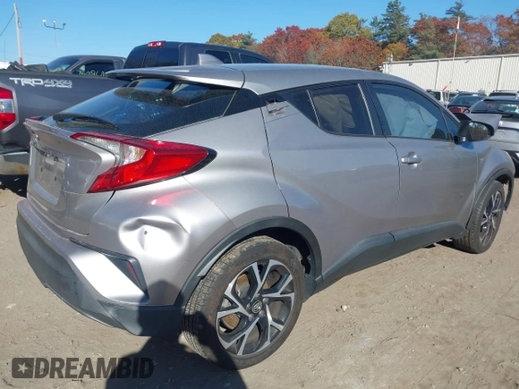 2019 Toyota C-HR XLE with VIN NMTKHMBXXKR069943, listed as a IAAI auction lot 40746144 with 85,713 mi miles and . Bid and sale history available at DreamBid. Image 4.