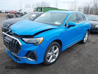 2020 Audi Q3 S line Premium z VIN WA1DECF39L1013425, wystawiony jako IAAI lot #41851042 z przebiegiem 57 901 mil mil oraz . Historia ofert i sprzedaży dostępna na DreamBid. Obrazek 2.
