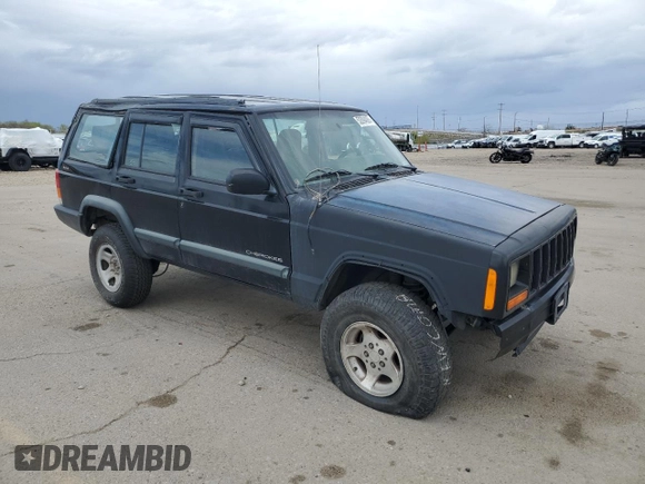 1998 Jeep Cherokee Sport with VIN 1J4FJ68S6WL188802, listed as a Copart auction lot 52094005 with 199,586 mi miles and Salvage Title. Bid and sale history available at carsss.com. Image 4.