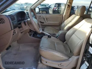 2001 Honda Passport LX z VIN 4S6DM58W014404165, wystawiony jako Copart lot #81636614 z przebiegiem 157 744 mil mil oraz Czysty tytuł • Clean title. Historia ofert i sprzedaży dostępna na DreamBid. Obrazek 7.