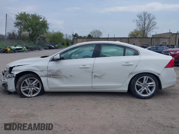 2014 Volvo S60 T5 z VIN YV1612FH8E1292976, wystawiony jako IAAI lot #42129708 z przebiegiem 162 083 mil mil oraz . Historia ofert i sprzedaży dostępna na DreamBid. Obrazek 15.