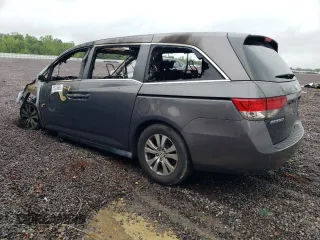 2014 Honda Odyssey EX-L with VIN 5FNRL5H66EB004583, listed as a Copart auction lot 57973685 with Not provided miles and Salvage title. Bid and sale history available at DreamBid. Image 2.