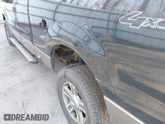 2005 Ford F-150 XLT with VIN 1FTPX14505FB72622, listed as a IAAI auction lot 41823532 with 165,918 mi miles. Bid and sale history available at carsss.com. Image 13.
