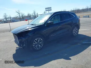 2020 Ford Escape Titanium z VIN 1FMCU9J98LUA44923, wystawiony jako IAAI lot #41779691 z przebiegiem 73 259 mil mil oraz . Historia ofert i sprzedaży dostępna na DreamBid. Obrazek 2.