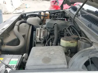 2000 Chevrolet Tahoe LS z VIN 1GNEC13T9YJ111037, wystawiony jako IAAI lot #42055433 z przebiegiem 248 812 mil mil oraz . Historia ofert i sprzedaży dostępna na DreamBid. Obrazek 21.