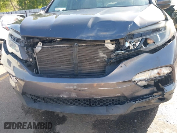 2016 Honda Pilot EX-L with VIN 5FNYF6H56GB007650, listed as a IAAI auction lot 42343914 with 147,354 mi miles and . Bid and sale history available at DreamBid. Image 6.