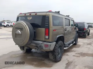 2005 Hummer H2 SUV z VIN 5GRGN23U95H132238, wystawiony jako IAAI lot #41809909 z przebiegiem 300 293 mil mil oraz . Historia ofert i sprzedaży dostępna na DreamBid. Obrazek 4.